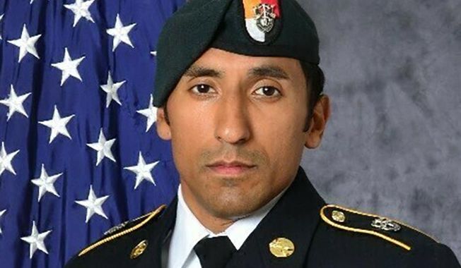 FILE - This undated photo provided by the U.S. Army shows U.S. Army Staff Sgt. Logan Melgar Green Beret, who died from non-combat related injuries in Mali in June 2017.  Tony DeDolph, a U.S. Navy SEAL, pleaded guilty Thursday, Jan. 14, 2021, to involuntary manslaughter for his role in the hazing-related death of Melgar.   (U.S. Army via AP, File)