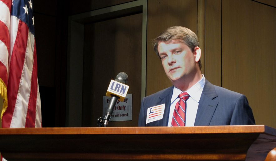 FILE - In this July 22, 2020 file photo, Luke Letlow, R-Start, chief of staff to exiting U.S. Rep. Ralph Abraham, speaks after signing up to run for Louisiana&#39;s 5th Congressional District in Baton Rouge, La.  The widow of Republican U.S. Rep.-elect Letlow is entering the race to fill the Louisiana congressional vacancy left by her husband’s death from complications related to COVID-19. Julia Barnhill Letlow announced her campaign launch Thursday, Jan. 14, 2021. (AP Photo/Melinda Deslatte, File)