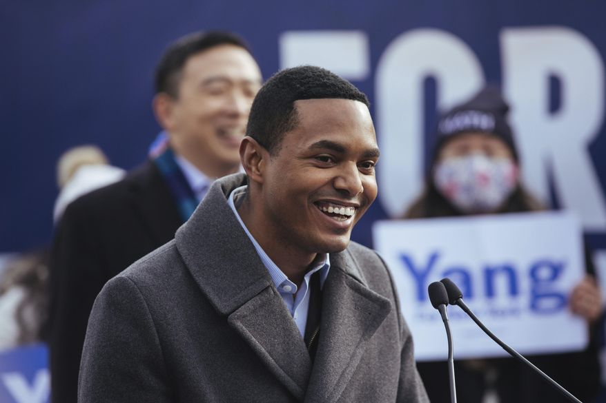 Newly-elected member of Congress Ritchie Torres announces that he is endorsing mayoral candidate Andrew Yang during a press conference in Morningside Park on Thursday, Jan. 14, 2021, in New York. (AP Photo/Kevin Hagen).