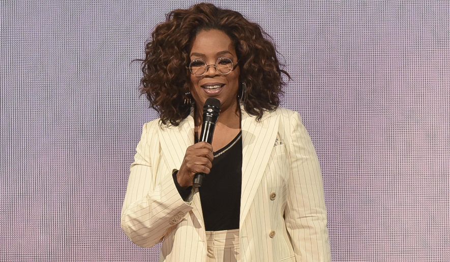 FILE - Oprah Winfrey makes opening remarks during &amp;quot;Oprah&#39;s 2020 Vision&amp;quot; tour on Feb. 29, 2020, in Inglewood, Calif. Winfrey will have a biographical documentary released on Apple TV+. The streaming platform announced Thursday, Jan. 14, 2021, that the two-part documentary will focus on Winfrey&#39;s life. (Photo by Richard Shotwell/Invision/AP, File)
