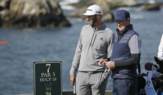 FILE - In this Saturday, Feb. 9, 2019, file photo, Dustin Johnson, left, and Wayne Gretzky stand on the seventh tee of the Pebble Beach Golf Links during the third round of the AT&amp;amp;T Pebble Beach Pro-Am golf tournament, in Pebble Beach, Calif. The Feb. 11-14 tournament will not have celebrities for the first time because of the COVID-19 pandemic. (AP Photo/Eric Risberg, File)