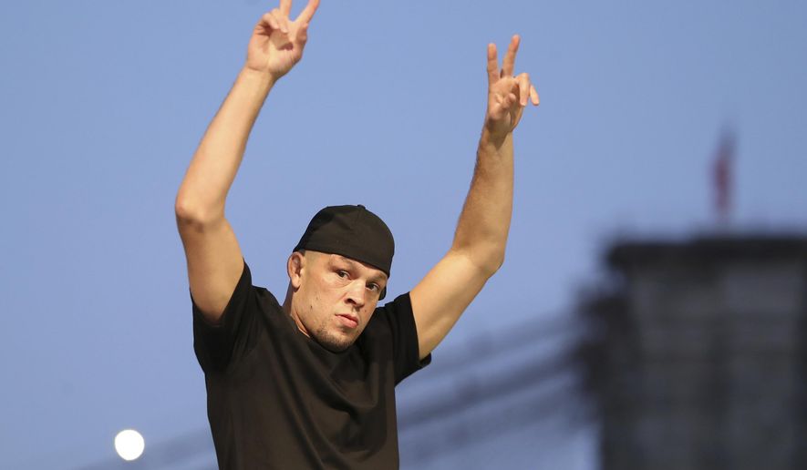 FILE - Nate Diaz is seen at a news conference for the UFC 244 mixed martial arts event in New York, in this Thursday, Sept. 19, 2019, file photo. The UFC will no longer punish fighters for using marijuana in most cases, making a major change to its anti-doping policy. The world’s largest mixed martial arts promotion won’t allow fighters to compete while under the influence of cannabinoids, but the promotion recognizes that MMA fighters often use marijuana for pain management or relaxation. Diaz is among many fighters who already used marijuana actively when not in competition. (AP Photo/Gregory Payan)