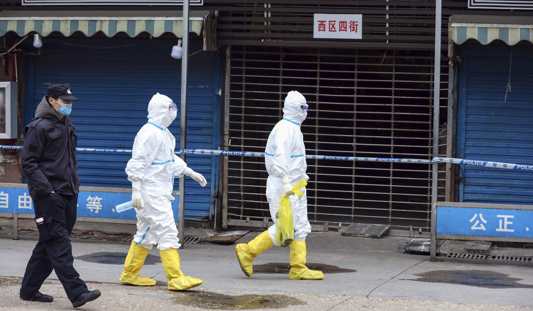 Image of article 'EXPLAINER: What is WHO team in Wuhan looking for'