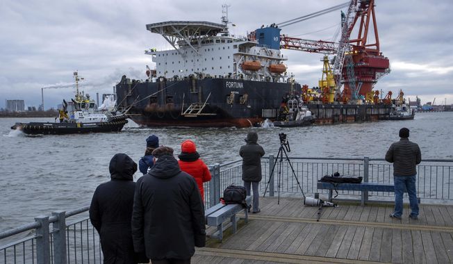 Tugs pull the Russian pipe-laying vessel &amp;quot;Fortuna&amp;quot; out of the harbor and into the Baltic Sea at the port of Wismar, Germany, Thursday, Jan 14, 2021. The special vessel is being used for construction work on the German-Russian Nord Stream 2 gas pipeline in the Baltic Sea. ( Jens Buettner/dpa via AP) ** FILE **