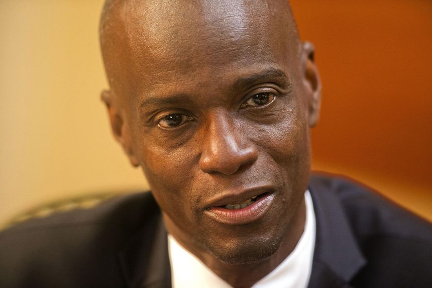 FILE - In this Feb. 7, 2020 file photo, Haiti&#39;s President Jovenel Moise speaks during an interview at his home in Petion-Ville, a suburb of Port-au-Prince, Haiti. Haiti is bracing for a fresh round of widespread protests starting Friday, Jan. 15, 2021, with opposition leaders demanding that President Moise step down next month, worried he is amassing too much power as he enters his second year of rule by decree. (AP Photo/Dieu Nalio Chery, File)