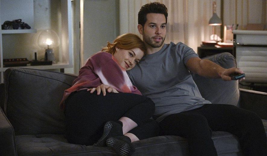 This image released by NBC shows Jane Levy, left, and Skylar Astin in a scene from "Zoey's Extraordinary Playlist." Season two of the musical series airs Tuesdays on NBC. (Sergei Bachlakov/NBC via AP)