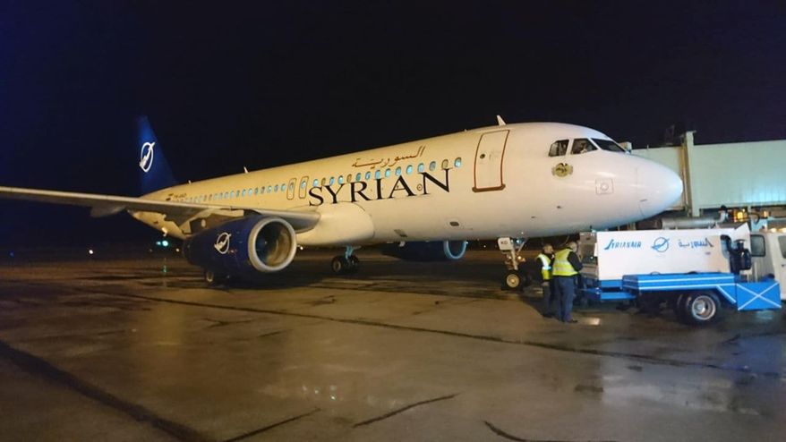 In this photo released by the Syrian official news agency SANA, a Syrian commercial plane coming from Lebanon, lands at Aleppo Airport, Syria, early Friday, Jan. 15, 2021. Syrian Air conducted its first flight in a decade between the northern city of Aleppo and Lebanon&#39;s capital Beirut on Friday, resuming a round-trip route that&#39;s been halted since Syria’s conflict began in 2011. (SANA via AP)