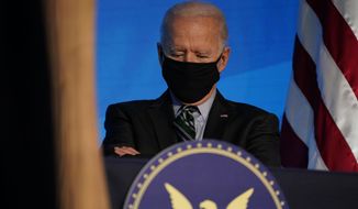 President-elect Joe Biden listens during an event at The Queen theater, Saturday, Jan. 16, 2021, in Wilmington, Del. (AP Photo/Matt Slocum)