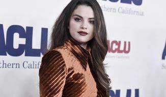 FILE - Selena Gomez attends the 2019 ACLU SoCal&#39;s Annual Bill of Rights Dinner in Beverly Hills, Calif. on Nov. 17, 2019. After an angry mob of President Donald Trump supporters took control of the U.S. Capitol in a violent insurrection, Gomez laid much of the blame at the feet of Big Tech. It’s the latest effort by the 28-year-old actress-singer to draw attention to the danger of internet companies critics say have profited from misinformation and hate on their platforms. (Photo by Richard Shotwell/Invision/AP, File)