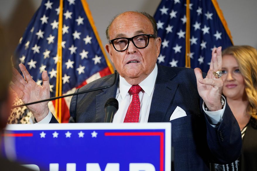 In this Nov. 19, 2020, file photo, former New York Mayor Rudy Giuliani, a lawyer for President Donald Trump, speaks during a news conference at the Republican National Committee headquarters, in Washington (Associated Press)