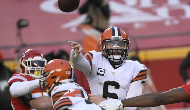 Cleveland Browns quarterback Baker Mayfield throws a pass during the second half of an NFL divisional round football game against the Kansas City Chiefs, Sunday, Jan. 17, 2021, in Kansas City. The Chiefs won 22-17. (AP Photo/Reed Hoffmann)