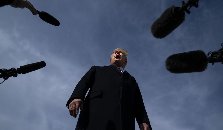 In this Feb. 18, 2020, file photo President Donald Trump talks with reporters before boarding Air Force One for a trip to Los Angeles to attend a campaign fundraiser in Andrews Air Force Base, Md. (AP Photo/Evan Vucci, File)