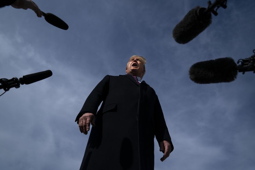 In this Feb. 18, 2020, file photo President Donald Trump talks with reporters before boarding Air Force One for a trip to Los Angeles to attend a campaign fundraiser in Andrews Air Force Base, Md. (AP Photo/Evan Vucci, File)