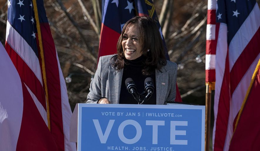 Vice President-Elect Kamala Harris campaigns for Democratic U.S. Senate challengers the Rev. Raphael Warnock and Jon Ossoff, Monday, Dec. 21, 2020, in Columbus, Ga. (AP Photo/Ben Gray)