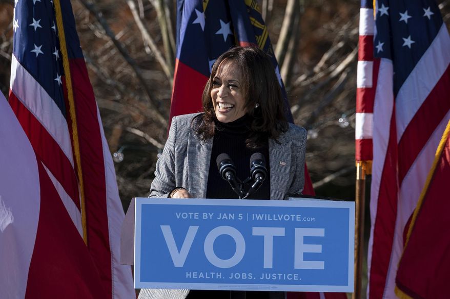Vice President-Elect Kamala Harris campaigns for Democratic U.S. Senate challengers the Rev. Raphael Warnock and Jon Ossoff, Monday, Dec. 21, 2020, in Columbus, Ga. (AP Photo/Ben Gray)