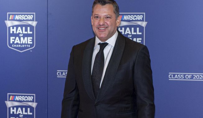 FILE - NASCAR Hall of Fame inductee Tony Stewart poses for pictures prior to the induction ceremony in Charlotte, N.C., in this Friday, Jan. 31, 2020, file photo. Tony Stewart wants to set the record straight about two misconstrued recent business decisions. Fans have been critical of Stewart since the Truck Series was dropped from Eldora Speedway and because he didn&#x27;t sign Kyle Larson to his NASCAR team. Stewart is adamant that he tried to sign Larson but couldn&#x27;t get partner approval on the driver suspended for using a racial slur. And he insists he dropped NASCAR after he felt slighted that Bristol Motor Speedway was given a Cup race on dirt. (AP Photo/Mike McCarn, File)