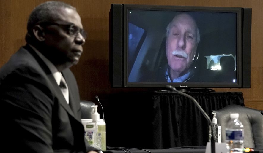 Sen. Angus King, I-Maine, appears virtual to ask questions during a confirmation hearing for Secretary of defense nominee Lloyd Austin, a recently retired Army general, before the Senate Armed Services Committee on Capitol Hill, Tuesday, Jan. 19, 2021, in Washington. King is en route to Washington to attend the inauguration of President-elect Joe Biden. (Greg Nash/Pool via AP)