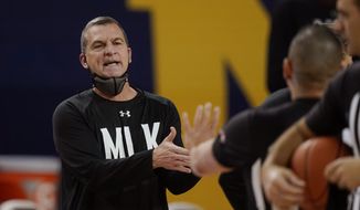 Maryland head coach Mark Turgeon argues a call during the second half of an NCAA college basketball game against Michigan, Tuesday, Jan. 19, 2021, in Ann Arbor, Mich. (AP Photo/Carlos Osorio)