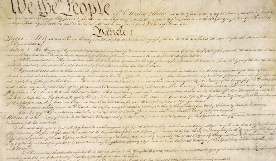 This photo made available by the U.S. National Archives shows a portion of the first page of the United States Constitution. According to NPD BookScan, which tracks around 85 percent of the print market, more than 1 million copies of the Constitution in various editions were sold since Trump took office. The sales are especially notable because the Constitution can be read or downloaded for free, including from the U.S. government. (National Archives via AP)