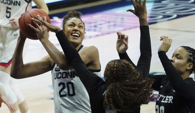 UConn forward Olivia Nelson-Ododa (20) shoots against Butler in the first half of an NCAA college basketball game Tuesday, Jan. 19, 2021, in Storrs, Conn. (David Butler II/Pool Photo via AP)