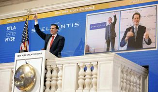 In this photo provided by the New York Stock Exchange, NYSE Vice Chairman John Tuttle, left, Stellantis CEO Carlos Taveras, center, and Chariman John Elkann, right, virtually ring the NYSE opening bell, Tuesday, Jan. 19. 2021. Stellantis shares start trading in New York in the new auto giant created by the merger of Fiat Chrysler and PSA Peugeot. (Colin Ziemer/New York Stock Exchange via AP)