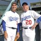 This June 8, 2013, photo shows Hall of Fame and former Los Angeles Dodgers pitcher Don Sutton, right, and Brooklyn Dodger pitcher Sandy Koufax, left, during the Old-Timers game prior to a baseball game between the Atlanta Braves and the Los Angeles Dodgers in Los Angeles. Sutton, a Hall of Fame pitcher who spent most of his career in a Los Angeles Dodgers&#x27; rotation that included Koufax and Don Drysdale, has died, Tuesday, Jan. 19, 2021. He was 75. (Keith Birmingham/The Orange County Register via AP, File)
