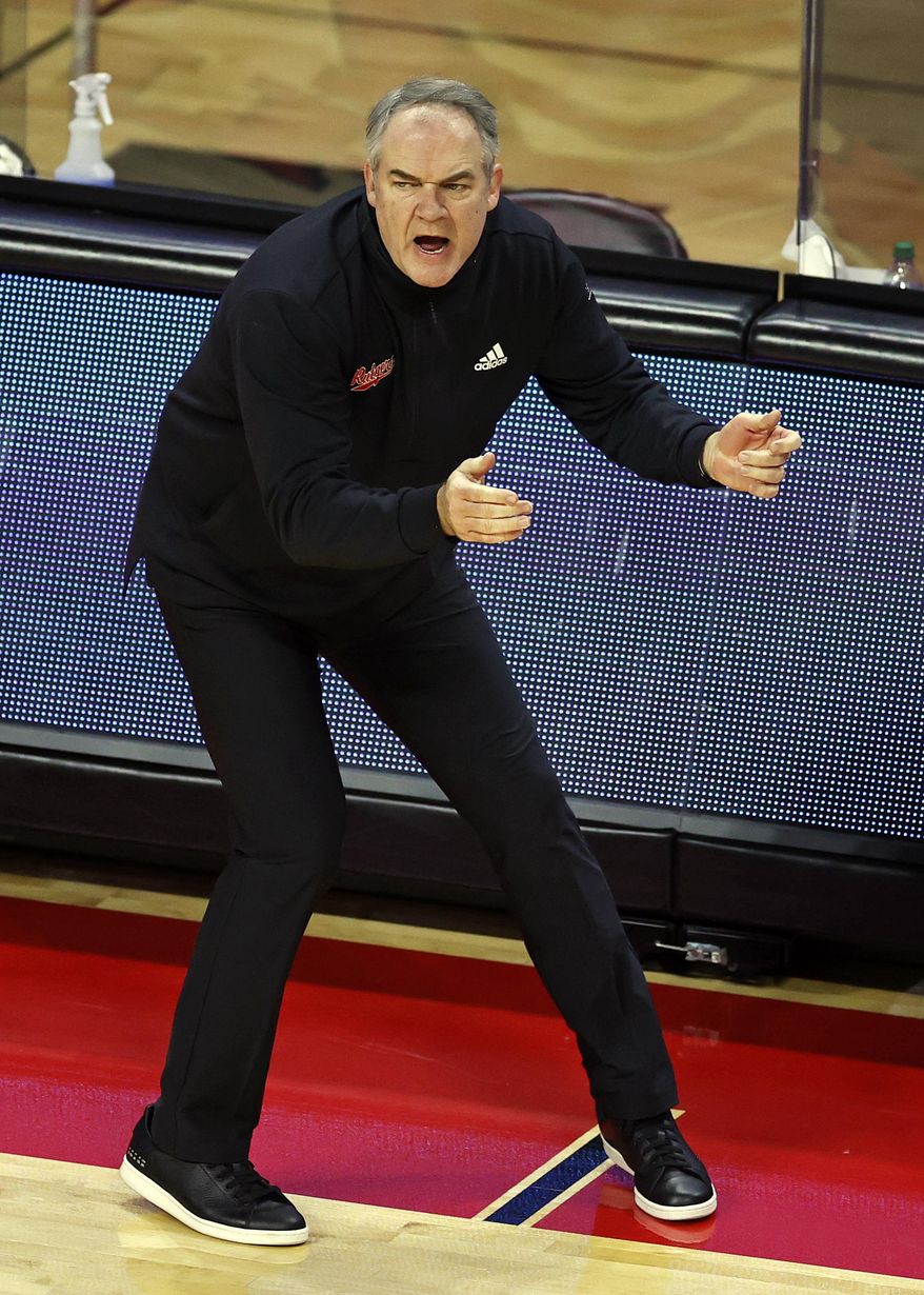 Rutgers head coach Steve Pikiell directs his team against Ohio State during the second half of an NCAA college basketball game Saturday, Jan. 9, 2021, in Piscataway, N.J. Ohio State won 79-68. (AP Photo/Adam Hunger)
