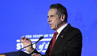 New York Gov. Andrew Cuomo delivers his State of the State address virtually from The War Room at the state Capitol, Monday, Jan. 11, 2021, in Albany, N.Y. (AP Photo/Hans Pennink, Pool) **FILE**