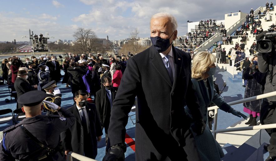 President Joe Biden and wife, first lady Jill Biden, depart the 59th Presidential Inauguration at the U.S. Capitol in Washington, Wednesday, Jan. 20, 2021. Joe Biden was sworn in as the 46th president of the U.S. and Harris became the first woman vice president. (Jonathan Ernst/Pool Photo via AP)