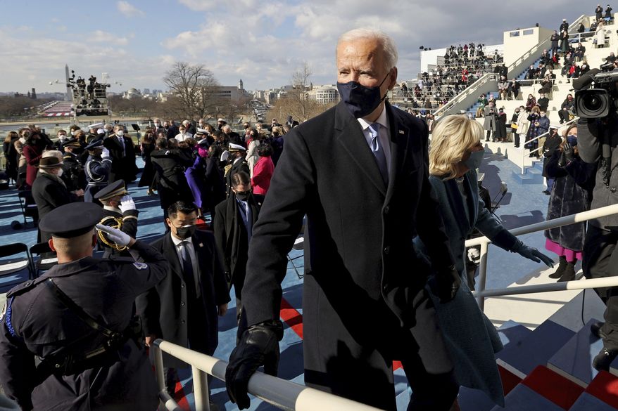President Joe Biden and wife, first lady Jill Biden, depart the 59th Presidential Inauguration at the U.S. Capitol in Washington, Wednesday, Jan. 20, 2021. Joe Biden was sworn in as the 46th president of the U.S. and Harris became the first woman vice president. (Jonathan Ernst/Pool Photo via AP)
