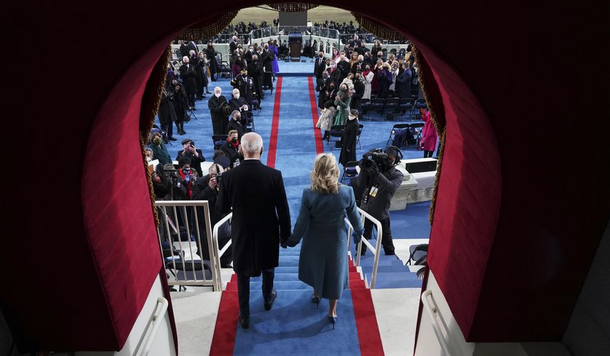 President-elect Joe Biden’s and Dr. Jill Biden arrive his inauguration at the U.S. Capitol in Washington, Wednesday, Jan. 20, 2021. (Chang W. Lee/The New York Times via AP, Pool)