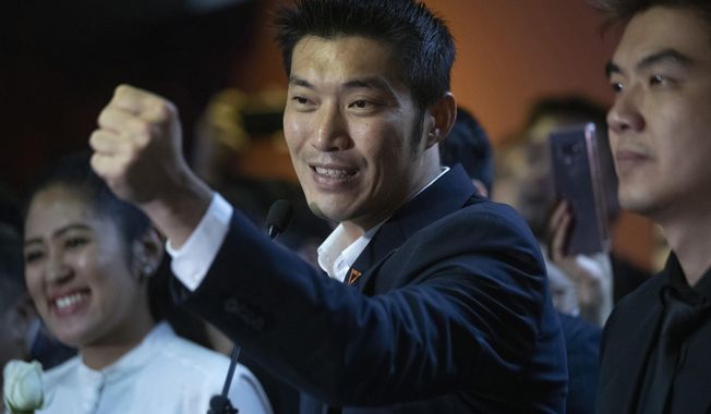 FILE - In this Jan. 21, 2020, file photo, Thailand&#x27;s Future Forward Party leader Thanathorn Juangroongruangkit gestures as he talks to media during a press conference at the party&#x27;s headquarters in Bangkok, Thailand. Thai officials on Wednesday, Jan. 20, 2021, filed criminal charges against Thanathorn, accusing him of defaming the monarchy by broadcasting his criticisms of the government&#x27;s efforts to secure supplies of coronavirus vaccine. (AP Photo/Sakchai Lalit, File)