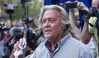 In this Aug. 20, 2020, file photo, President Donald Trump&#39;s former chief strategist, Steve Bannon, speaks with reporters in New York after pleading not guilty to charges that he ripped off donors to an online fundraising scheme to build a southern border wall. (AP Photo/Eduardo Munoz Alvarez, File)