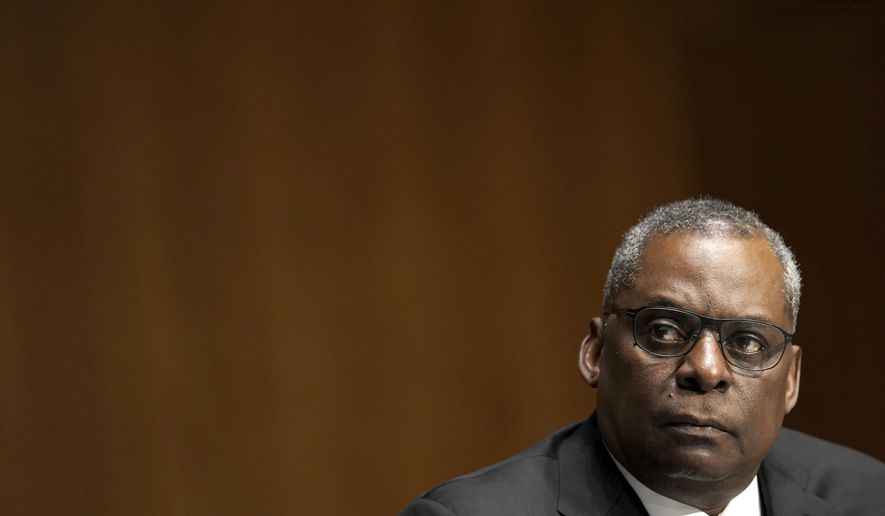Secretary of Defense nominee Lloyd Austin, a recently retired Army general, listens during his conformation hearing before the Senate Armed Services Committee on Capitol Hill, Tuesday, Jan. 19, 2021, in Washington. (Greg Nash/Pool via AP)