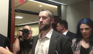 FILE - In this May 29, 2015, file photo, television actor Dustin Diamond, center, leaves court in Port Washington, Wis., after being convicted of two misdemeanors stemming from a barroom fight on Christmas Day 2014. Diamond is undergoing chemotherapy treatments after being diagnosed with cancer, according to his representative. Diamond, best known for playing Screech on the hit ’90s sitcom, was hospitalized earlier this month in Florida. Last week, his team disclosed he did have cancer. (AP Photo/Dana Ferguson, File)