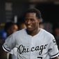 FILE - In this Sept. 20, 2019, file photo, Chicago White Sox&#39;s Tim Anderson smiles in the dugout during the second inning of the team&#39;s baseball game against the Detroit Tigers in Detroit. Anderson landed a spot on a video game cover Thursday, Jan.21. He&#39;d like a World Series ring to go with it. Anderson sees no reason why the White Sox can&#39;t win it all after loading up on the heels of a breakthrough playoff season. (AP Photo/Paul Sancya, File)