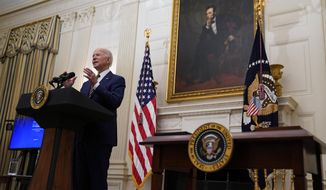 President Joe Biden delivers remarks on the economy in the State Dining Room of the White House, Friday, Jan. 22, 2021, in Washington. (AP Photo/Evan Vucci)