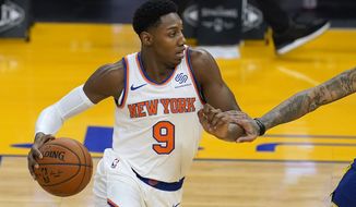 New York Knicks guard RJ Barrett works against the Golden State Warriors during the first half of an NBA basketball game in San Francisco, Thursday, Jan. 21, 2021. (AP Photo/Jeff Chiu)
