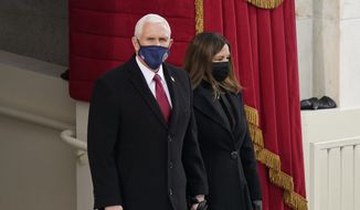 Vice President Mike Pence and his wife Karen, arrive for the 59th Presidential Inauguration at the U.S. Capitol for President-elect Joe Biden in Washington, Wednesday, Jan. 20, 2021. (AP Photo/Carolyn Kaster)  **FILE**