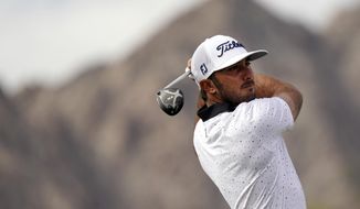 Max Homa hits from the first tee during the third round of The American Express golf tournament on the Pete Dye Stadium Course at PGA West Saturday, Jan. 23, 2021, in La Quinta, Calif. (AP Photo/Marcio Jose Sanchez)