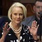 In this Jan. 13, 2020, photo Cindy McCain, wife of former Arizona Sen. John McCain, waves to the crowd after being acknowledged by Arizona Republican Gov. Doug Ducey during his State of the State address on the opening day of the legislative session at the Capitol in Phoenix. (AP Photo/Ross D. Franklin) **FILE**