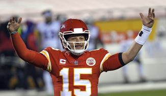 Kansas City Chiefs quarterback Patrick Mahomes celebrates at the end of the AFC championship NFL football game against the Buffalo Bills, Sunday, Jan. 24, 2021, in Kansas City, Mo. The Chiefs won 38-24. (AP Photo/Reed Hoffmann)