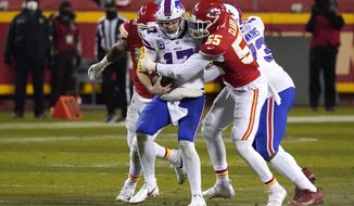 Buffalo Bills quarterback Josh Allen (17) is sacked by Kansas City Chiefs defensive end Frank Clark (55) during the second half of the AFC championship NFL football game, Sunday, Jan. 24, 2021, in Kansas City, Mo. (AP Photo/Jeff Roberson)
