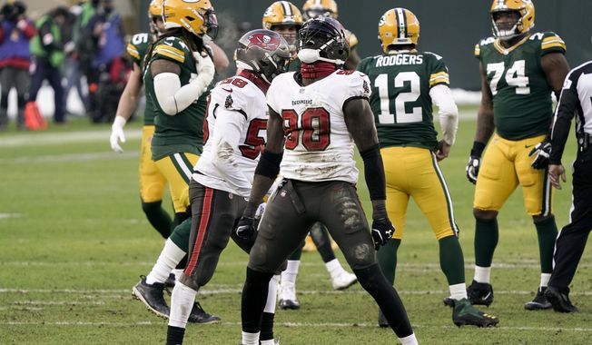 Tampa Bay Buccaneers&#x27; Jason Pierre-Paul reacts after sacking Green Bay Packers quarterback Aaron Rodgers during the first half of the NFC championship NFL football game in Green Bay, Wis., Sunday, Jan. 24, 2021. (AP Photo/Morry Gash) **FILE**