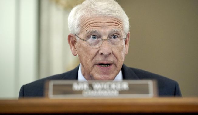 Sen. Roger Wicker, R-Miss., speaks during a hearing before the Senate Commerce Committee on Capitol Hill, Wednesday, Oct. 28, 2020, in Washington. The committee summoned the CEOs of Twitter, Facebook and Google to testify during the hearing. (Greg Nash/Pool via AP)