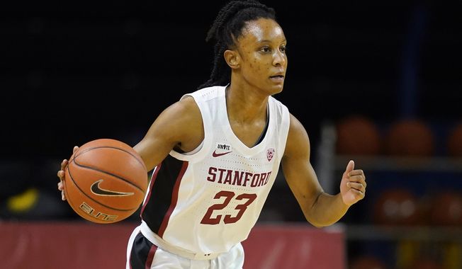 Stanford guard Kiana Williams dribbles the ball up the court against Southern California during the first half of an NCAA college basketball game in Santa Cruz, Calif., Sunday, Jan. 24, 2021. (AP Photo/Jeff Chiu)