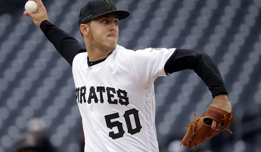 FILE - In this April 25, 2019, file photo, Pittsburgh Pirates starting pitcher Jameson Taillon delivers during the first inning of a baseball game against the Arizona Diamondbacks in Pittsburgh. A person familiar with the trade talks tells The Associated Press the New York Yankees made the second addition to their starting rotation of the offseason, agreeing to acquire right-hander Taillon from the Pirates for four prospects. (AP Photo/Gene J. Puskar, File)