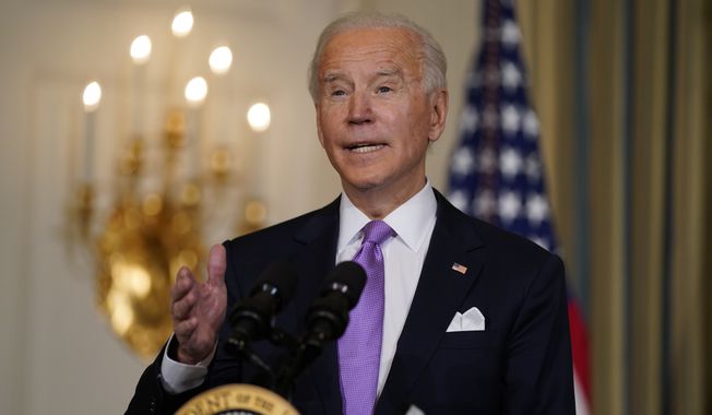 President Joe Biden delivers remarks on racial equity, in the State Dining Room of the White House, Tuesday, Jan. 26, 2021, in Washington. (AP Photo/Evan Vucci)