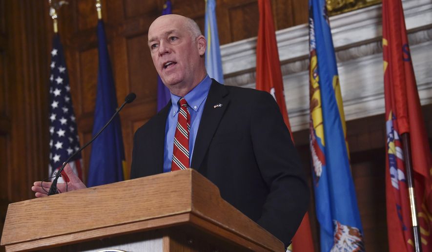 FILE - In this Jan. 5, 2021 file photo Montana Gov. Greg Gianforte speaks to members of the press in the Governor's Reception Room of the Montana State Capitol in Helena, Mont. Montana House lawmakers voted Monday, Jan. 25, 2021, to advance four bills that would restrict abortion access in the state, hoping to capitalize on the election of a Republican governor after 16 years of pro-abortion access Democratic governors in the state. Gianforte has promised to "defend life," giving anti-abortion lawmakers and activists hope that the bills will be signed into law. (Thom Bridge/Independent Record via AP, File)