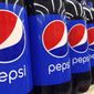 FILE - In this July 9, 2015, file photo, Pepsi bottles are on display for sale at a supermarket in Haverhill, Mass. PepsiCo Inc. reports earnings, Wednesday, Oct. 4, 2017. PepsiCo, which makes Frito Lay chips and Quaker cereals, is getting a boost as more U.S. consumers eat breakfast and snack at home. The Purchase, New York-based company said Tuesday, April 28, 2020, that its organic sales grew 7.9% in the first quarter. (AP Photo/Elise Amendola, File)